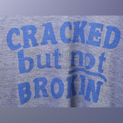 Lot # 148 - S5E03 - "Basic Intergluteal Numismatical": Three "Cracked But Not Broken" T-Shirts