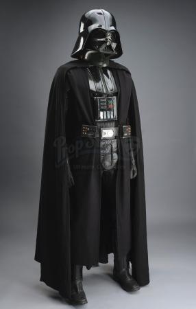 Lot #672 - STAR WARS: A NEW HOPE (1977) - 1977/1978 Darth Vader Promotional Costume With Poster-Matched Helmet - 2