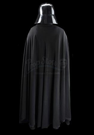 Lot #672 - STAR WARS: A NEW HOPE (1977) - 1977/1978 Darth Vader Promotional Costume With Poster-Matched Helmet - 9