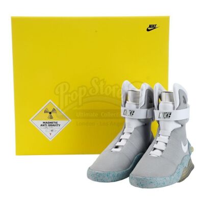 Lot # 30: BACK TO THE FUTURE PART II (1989) - Official Licensed (2011) Light-Up Size 7 Marty McFly (Michael J. Fox) Nike MAG Shoes
