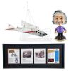 Lot # 915: NIGHT AT THE MUSEUM: BATTLE OF THE SMITHSONIAN (2009) - SpaceShipOne Model Miniature, Einstein Bobblehead, and Framed Attila the Hun Pages