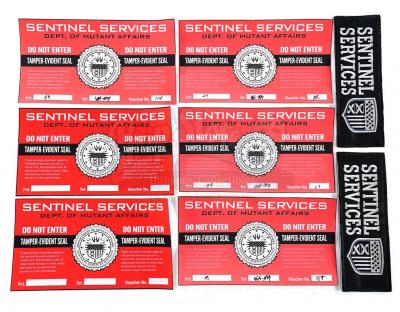 Lot # 30: The Gifted - Sentinel Services Patches and Warning Stickers